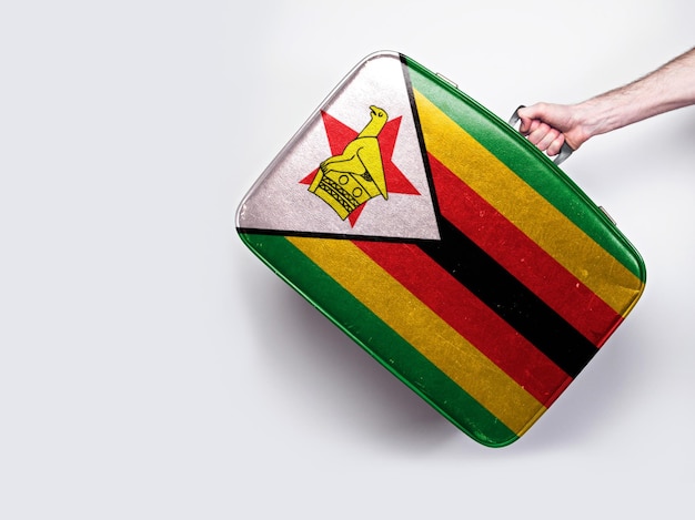 Flaga Zimbabwe na skórzanej walizce vintage