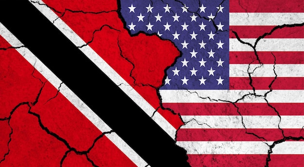 Flagi Trynidadu i Stanów Zjednoczonych na pękniętej powierzchni koncepcji stosunków politycznych