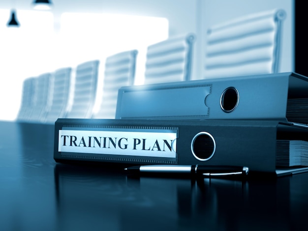 Folder planu szkolenia na pulpicie roboczym Plan szkolenia Koncepcja biznesowa na stonowanym tle Folder plików z napisem Plan szkolenia na czarnym pulpicie Renderowanie 3D