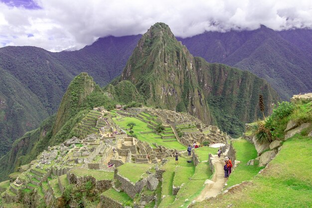 Fotografia w tle historycznego sanktuarium Machu Picchu