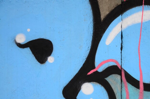 Fragment kolorowych malowideł graffiti z konturami i cieniami z bliska