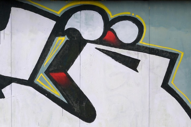 Fragment kolorowych malowideł ulicznych graffiti z konturami i cieniowaniem z bliska