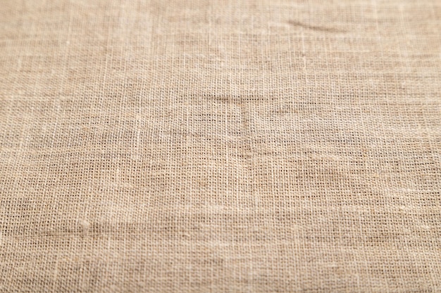 Fragment szorstkiej tkanki lnianej Widok z boku naturalne tło tekstylne