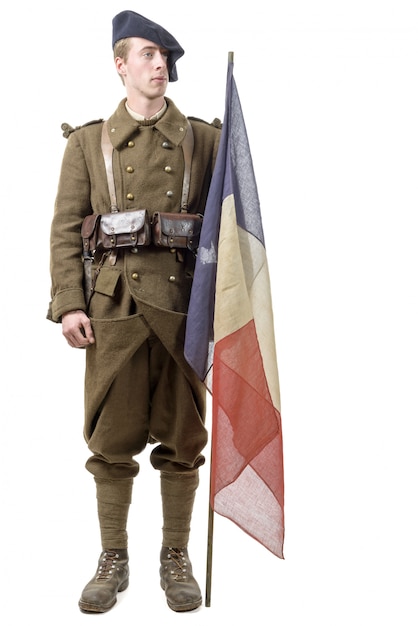 francuski żołnierz z flagą