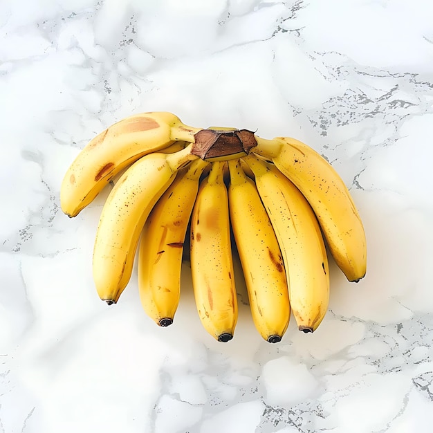 garstka bananów, które są na powierzchni marmuru