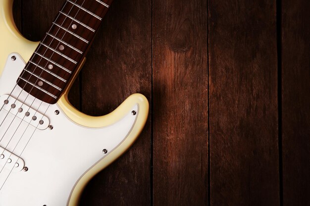 Gitara elektryczna na drewniane tła z bliska