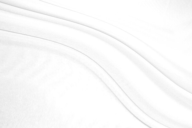 Gładka, elegancka biała jedwabna lub satynowa luksusowa tekstura tkaniny może służyć jako tło weselne Luksusowy wzór tła