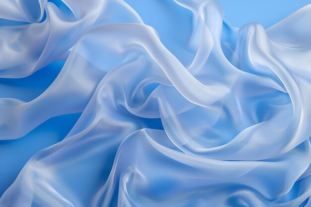 Zdjęcie gładka, elegancka, przezroczysta niebieska tkanina oddzielona na niebieskim