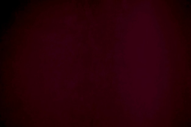 Zdjęcie gradientnie ciemnoczerwona tekstura jedwabnej tkaniny używana jako tło czerwona tkanina panne tło miękkiego i gładkiego materiału włókienniczego zmiażdżony aksamit luksusowy szkarłat dla aksamitów