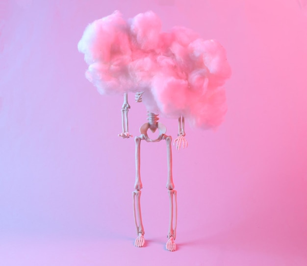 Grafika koncepcyjna Szkielet w pływającej puszystej chmurze Niebieski różowy neonowy gradient światła Kreatywny pomysł Minimalizm Surrealizm