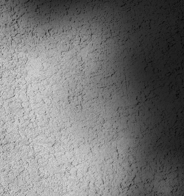 Grunge czarno-białe tło Szorstka teksturowana powierzchnia z efektem świetlnym