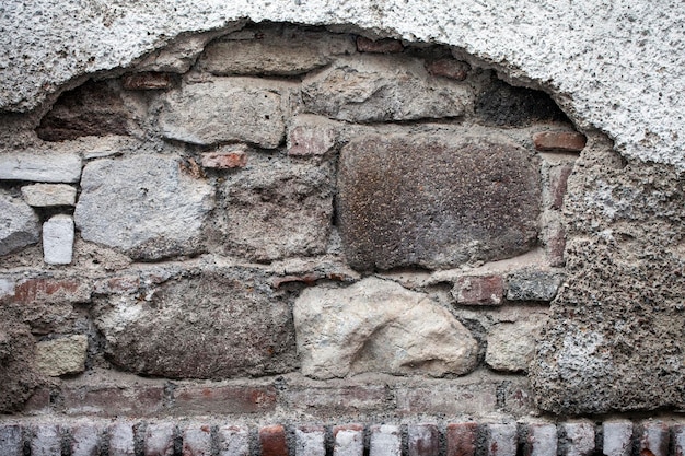 Grunge kamiennej ściany z cegły tekstury tła