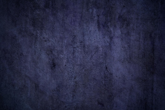 Grunge teksturowanej ciemnofioletowej powierzchni betonowej ściany na tle