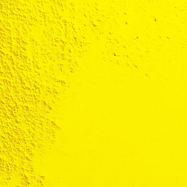 Grunge zardzewiały żółty stary beton pęknięty abstrakcyjna tekstura studio ściana tło