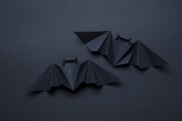 Halloweenowe upiorne tło nietoperzy draculi wykonane z origami