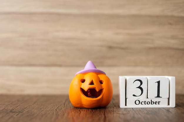 Happy Halloween dzień z dynią Jack O lantern i kalendarzem 31 października Trick or Threat Witam październik jesień jesień Świąteczna koncepcja przyjęcia i wakacji