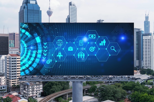 Hologram badawczo-rozwojowy na billboardzie nad panoramą miasta Kuala Lumpur KL jest centrum nowych technologii optymalizujących biznes w Malezji Azja Koncepcja przekraczania możliwości