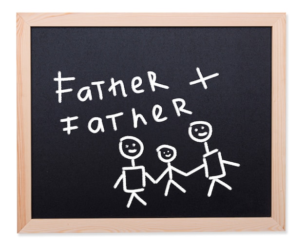 Homoseksualna rodzina, dwa mężczyzna i dziecko rysujący kredą na czarnym chalkboard, pojęcie obrazek