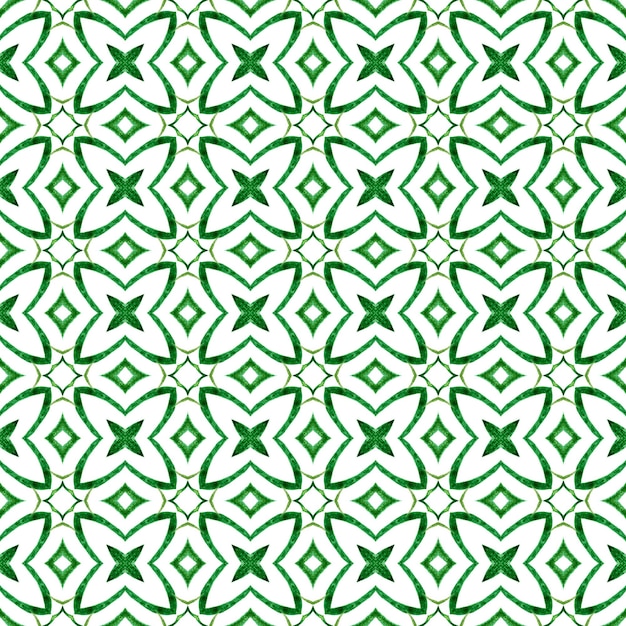 Ikat powtarzający się projekt stroju kąpielowego. Zielony olśniewający letni szyk boho. Tekstylny, schludny nadruk, tkanina na stroje kąpielowe, tapeta, opakowanie. Akwarela ikat powtarzające się obramowanie płytek.
