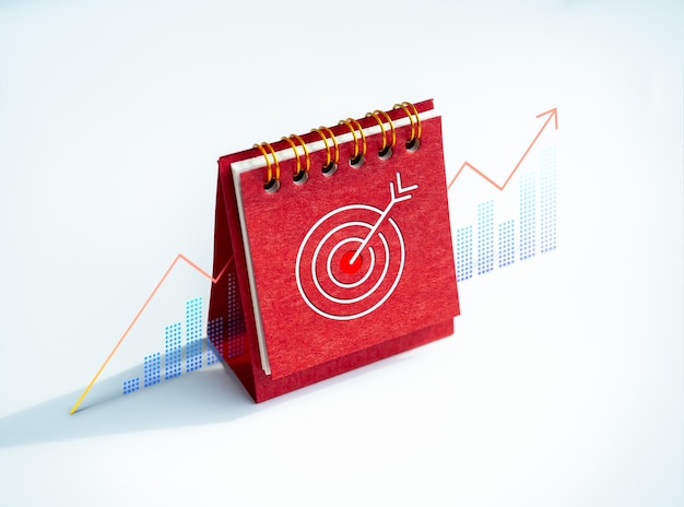 Ikona celu na czerwonym biurku okładka kalendarza stojąca z wykresem wzrostu biznesu na białym tle Cele biznesowe i plan działania na sukces, przywództwo i koncepcje inwestycyjne