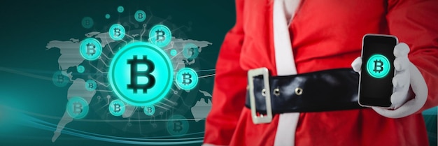 Ikony bitcoin i świąteczny mikołaj trzymający telefon