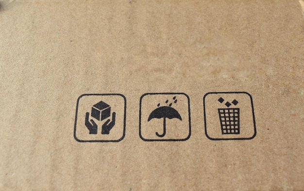 Zdjęcie ikony na opakowaniu z kartonu, takie jak delikatny materiał, nie mokre i używać pojemnika po użyciu