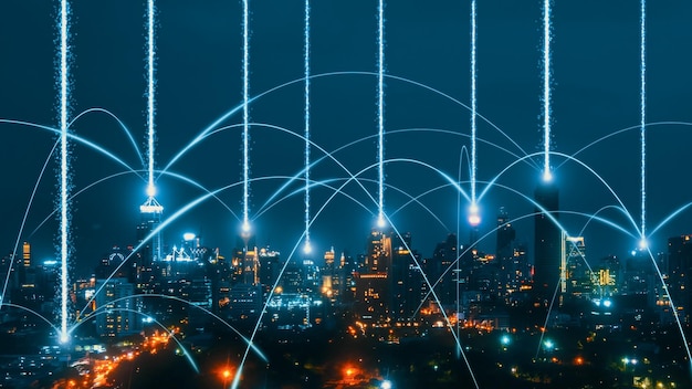 Zdjęcie inteligentne cyfrowe miasto z wzajemnością sieci połączeń nad pejzażem miejskim