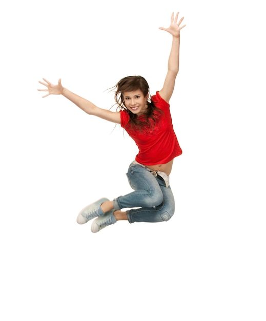 jasny obraz szczęśliwej skaczącej nastolatki