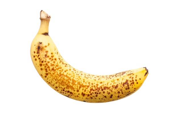 Jeden przejrzały, łagodny banan na białym tle