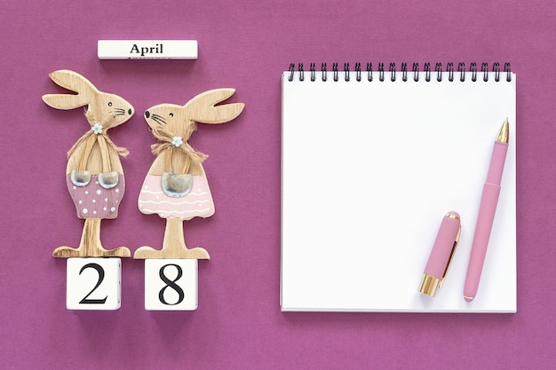 Kalendarz 28 kwietnia, wielkanocne króliczki, notatnik Koncepcja chrześcijańska Wielkanoc