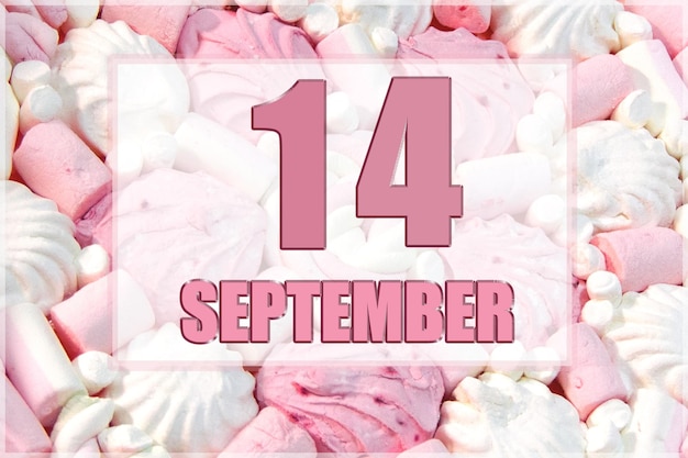 Kalendarzowa data na tle biało-różowych pianek 14 września to czternasty dzień miesiąca