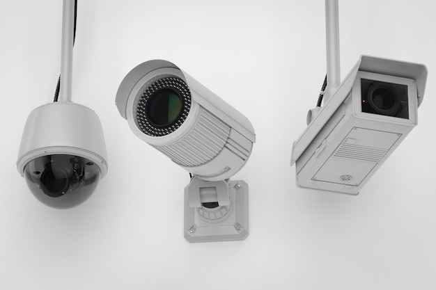 Zdjęcie kamera bezpieczeństwa renderowania 3d lub kamera cctv na suficie