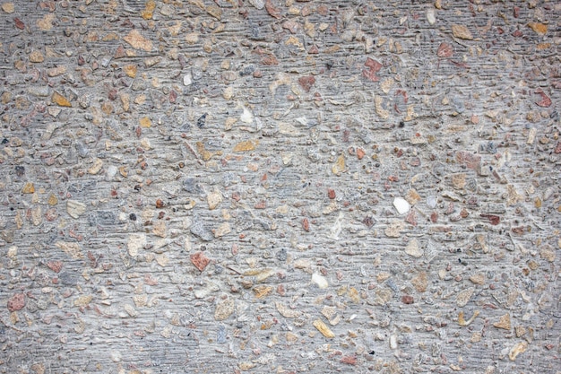Kamienie w betoniePowierzchnia kamieni i betonu Tekstura tła
