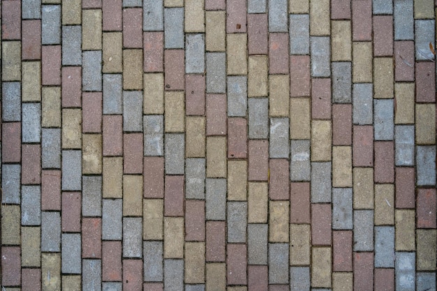 Kamienna droga z kolorowymi płytkami Tekstura chodnika