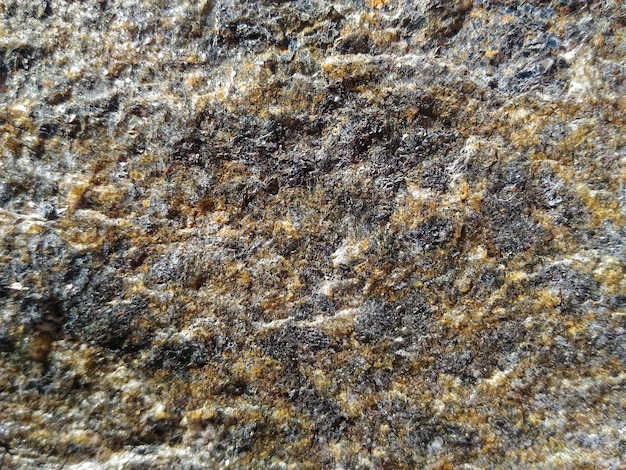 Kamienny marmur Teksturowana porowata kamienna struktura ściany
