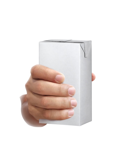 Karton opakowania mleka lub soku w ręku na białym tle