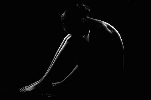 Kobieca sylwetka Nude Kobieta w ciemności