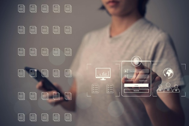 Kobieta skanująca odcisk palca w celu odblokowania hasła do telefonu komórkowego Odblokowywanie odcisku palca w celu uzyskania dostępu do informacji za pomocą technologii internetowej