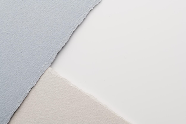 Kolaż artystyczny kawałków podartego papieru z podartymi krawędziami Kolekcja karteczek samoprzylepnych szaro-białe kolory strzępy stron notesu Abstrakcyjne tło