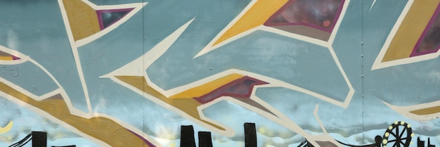 Kolorowe tło grafiki malarstwa graffiti z jasnymi paskami aerozolu na metalowej ścianie