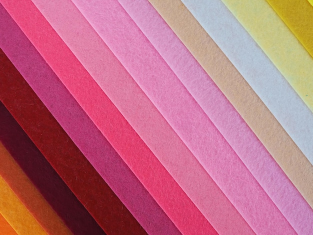 Kolorowe tło Stos kolorowej tkaniny Pełne ujęcie z wielu kolorowych tkanin w tle