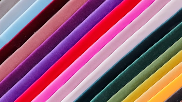 Kolorowe tło Stos kolorowej tkaninyPełna rama strzał z kolorowego tła tkaniny muti