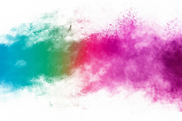 Kolorowe tło wybuchu pastelowego proszku Wielokolorowe rozpryski pyłu na białym tle Pomalowany Holi
