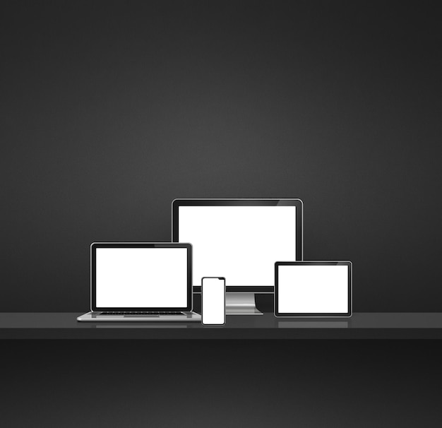 Zdjęcie komputer laptop telefon komórkowy i cyfrowy tablet pc czarne tło półki ściennej ilustracja 3d