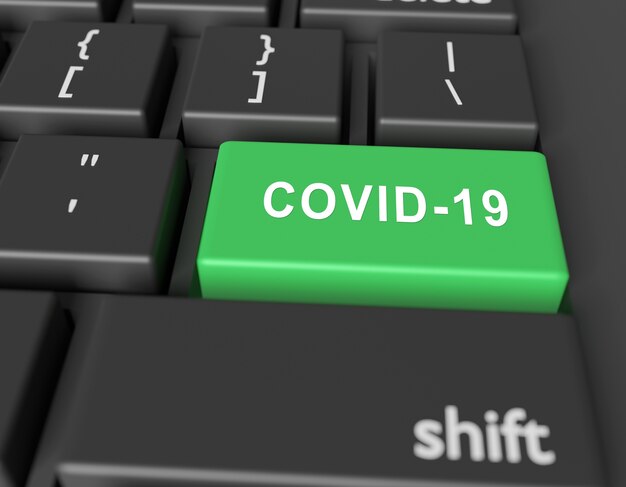 Koncepcja COVID-19. Słowo COVID-19 na przycisku klawiatury komputera