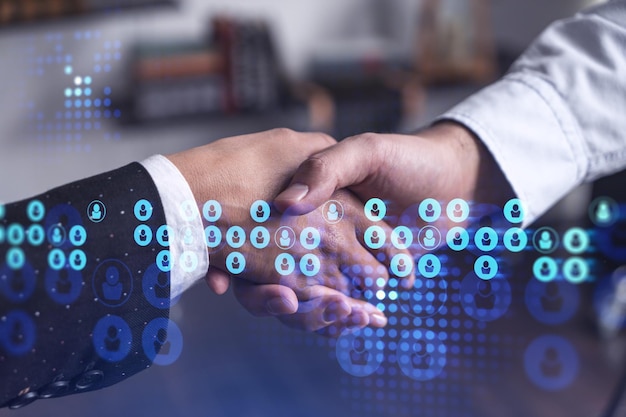 Koncepcja rekrutacji zatrudnienia nowych utalentowanych specjalistów dla międzynarodowej firmy Handshake jako koncepcja umowy o podpisanie umowy o pracę Ikony hologramów w mediach społecznościowych