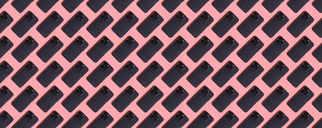 Koncepcja wzoru reklamy Telefon komórkowy na różowym tle