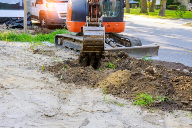 Koparka maszyna rozładowująca ziemię, roboty ziemne, roboty budowlane