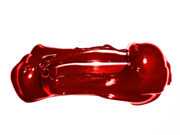 kropelka artysty czerwona farba akrylowa na białym tle