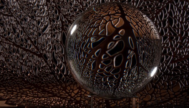 Kryształowa kula odzwierciedlająca abstrakcyjne tło pełne szczegółów, selektywne focus.
